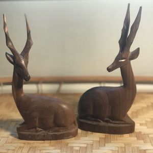 Vintage hand carved antelopes
